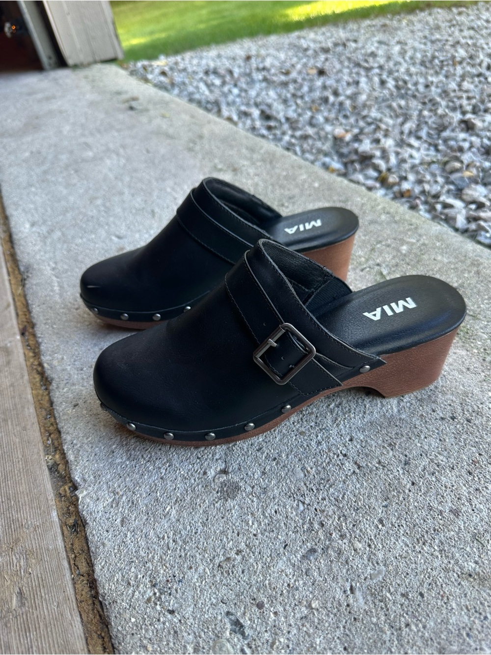 MIA Black Leather Clog Mules with Buckle Accent